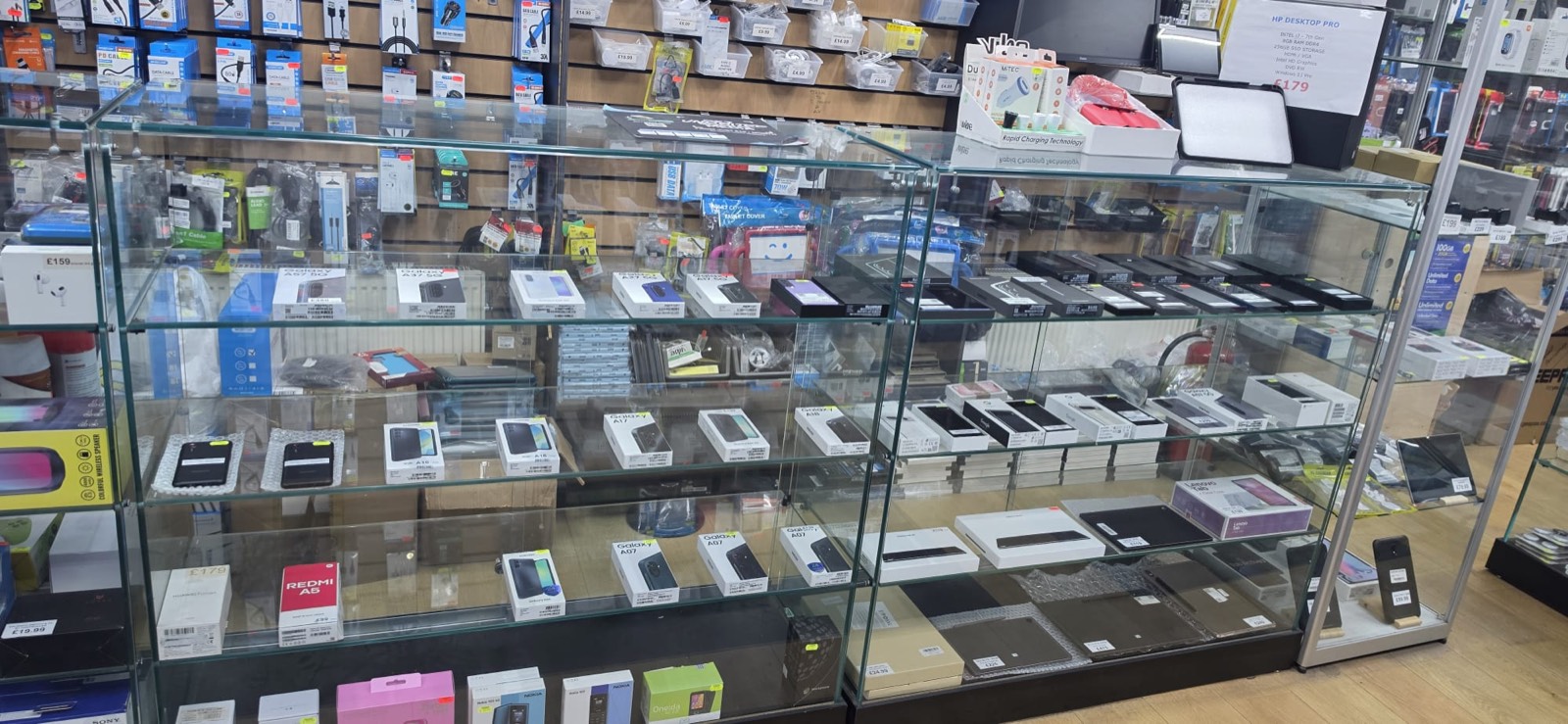 Display cabinets of new Samsung Galaxy, Google Pixel, Redmi and Nokia phones and tablets at PC Cellular